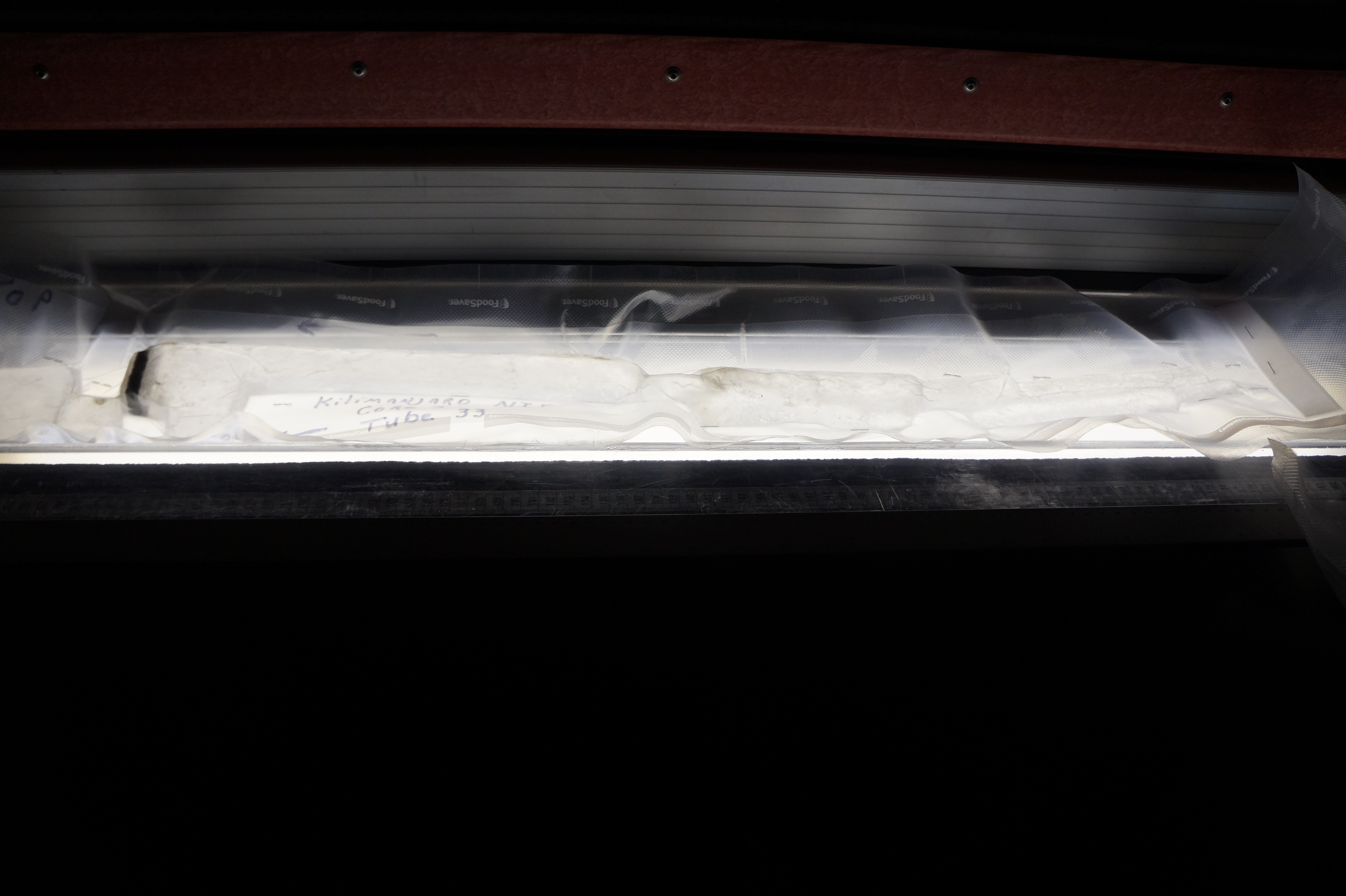 Ice core from Mt. Kilimanjaro. The dark band is dust, indicating a long drought.